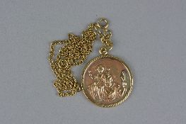 A 9CT ST CHRISTOPHER PENDANT, on a 9ct chain, approximate weight 15 grams