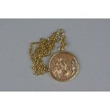 A 9CT ST CHRISTOPHER PENDANT, on a 9ct chain, approximate weight 15 grams