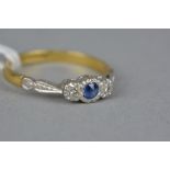 A MID 20TH CENTURY SAPPHIRE AND DIAMOND RING, estimated eight cut diamond weight 0.02ct, ring size