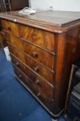A VICTORIAN FLAME MAHOGANY CHEST, of two short over four long drawers