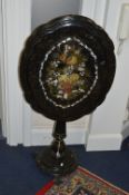 A VICTORIAN PAPIER MACHE AND WOODEN TILT TOP TABLE, of wavy oval form, painted and mother of pearl