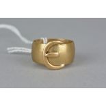 A MID TO LATE 20TH CENTURY WIDE 9CT BUCKLE RING, measuring approximately 11.6mm in diameter, ring