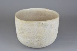 PETER HAYES (B.1946), a large Raku bowl with a matt white finish to the exterior, with a sgraffito
