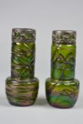 A PAIR OF KRALIK STYLE VASES, with an iridescent body and ribbon trails over, the rims having