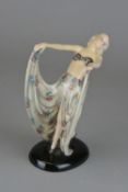A GOLDSCHEIDER STEPHAN DAKON ART DECO FIGURE MODELLED AS A LADY, posed with outstretched arms