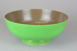 A RUSKIN POTTERY EGG SHELL POTTERY FOOTED BOWL, textured green glaze to exterior and textured