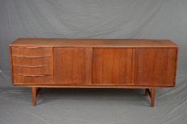 E. W BACH FOR SEJLING SKABE FOR KOLIND, DENMARK, a teak 1960's sideboard, flanked with four