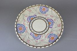 A CHARLOTTE RHEAD CROWN DUCAL CHARGER, in the 4300 Tudor Rose pattern, tube lined decoration,