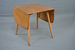 AN ERCOL ELM 1960'S DROP-LEAF TABLE, on square tapering legs, approximate size extended width