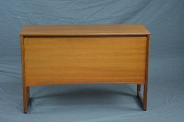 A DANISH STYLE 1970'S TEAK RECORD CABINET, with a fall front door revealing metal spindles,