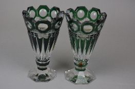 A PAIR OF VAL ST. LAMBERT FLASH CUT EMERALD TO CLEAR VASES, having a castellated cut rim with panels