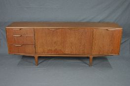 A MCINTOSH & CO LTD TEAK SIDEBOARD, with central double cupboard flanked by three graduated