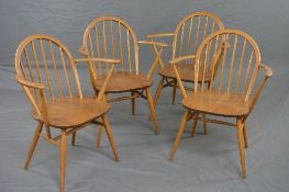 A SET OF FOUR ERCOL ELM 1960'S STICK BACK ARMCHAIRS (split to seat on one chair)