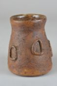 PETER HAYES (B.1946), a small brown ceramic vase with applied decoration to the body, initialled P.H