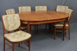A G-PLAN FRESCO OVAL EXTENDING DINING TABLE, on four cylindrical tapering legs, approximate size