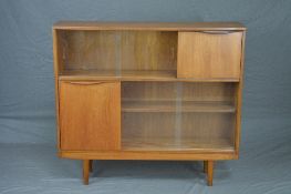 HERBERT GIBBS STYLE TEAK BOOKCASE, with double glazed sliding doors, fall front and single