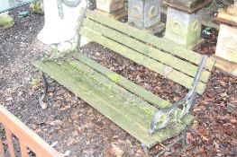 A CAST IRON ENDED GARDEN BENCH, 120cm wide