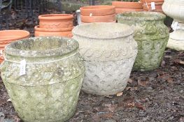 THREE MODERN COMPOSITE GARDEN PLANT POTS, in the form of ewes, 44cm in diameter and 40cm high (3)