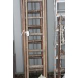 THREE SETS OF WOODEN EXTENSION LADDERS, 284cm long