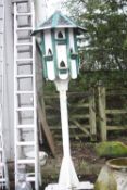 A MODERN PAINTED DOVECOTE ON BLOCK STAND, standing 270cm high