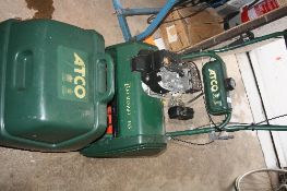 AN ATCO BALMORAL 14S CYLINDER PETROL LAWN MOWER, with spare blade and scarifier attatchment