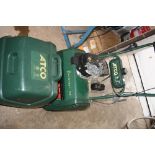 AN ATCO BALMORAL 14S CYLINDER PETROL LAWN MOWER, with spare blade and scarifier attatchment