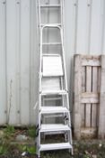 AN ALUMINIUM LADDER, and two step ladders (3)