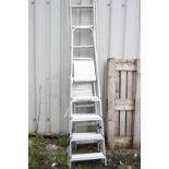 AN ALUMINIUM LADDER, and two step ladders (3)