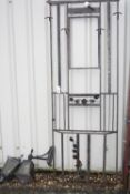 A WROUGHT IRON COAT STAND