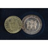 A GOLD NAPOLEON III 20 FRANK COIN 1866, together with a 12K gold 1972 20 Dollar coin Jamaica (2)