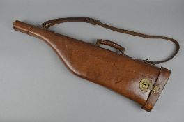 A LEG OF LAMB STYLE BROWN LEATHER GUN CASE, all intact with straps, carrying handle, etc, no