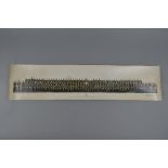 A CARD TUBE CONTAINING A WIDE ANGLE PHOTOGRAPH OF MEMBERS OF THE METROPOLITAN-CAMMELL CARRIAGE &