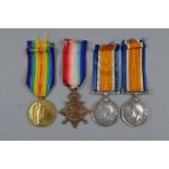 A GROUP OF FOUR WWI MEDALS, all to different recipients, 1914-15 Star named 918 Sjt R. Kerr,