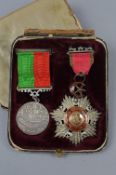 OLD SILK LINED BOX, containing two Turkish/Otterman medals, Medjidie Order, believed silver grade,
