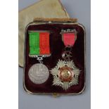 OLD SILK LINED BOX, containing two Turkish/Otterman medals, Medjidie Order, believed silver grade,