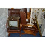 A PAIR OF BROWN LEATHER STYLE ROCKING ARMCHAIRS