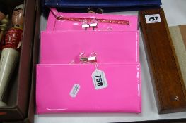 THREE PINK PATENT TED BAKER MATINEE PURSES