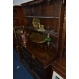 AN EARLY 20TH CENTURY CARVED OAK DRESSER, with two drawers and brass swan neck handles above