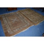 AN AFGHAN STYLE RUG ON SILK BACKING, russet ground with geometric detail, approximate size length