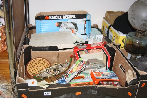 TWO BOXES OF SUNDRY ITEMS, to include die-cast vehicles, Dominoes, Black & Decker Drill/