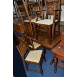 AN OAK DRAW LEAF DINING TABLE, and five chairs including one carver (6)