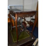 AN EDWARDIAN MAHOGANY CROSS STRETCHERED OCCASIONAL TABLE and a modern mahogany bedroom chair (2)