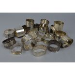 A COLLECTION OF TWENTY SILVER NAPKIN RINGS, approximate weight 495 grams