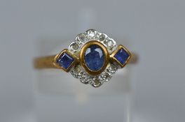 A MODERN 9CT GOLD SAPPHIRE AND DIAMOND DRESS RING, estimated total diamond weight 0.05ct, ring