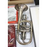 A HENRY DISTIN SILVER PLATED ON BRASS CORNET, engraved decoration, lacks mouthpiece, serial no.