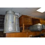 THREE GALVANISED MILK CHURNS (one lid missing)