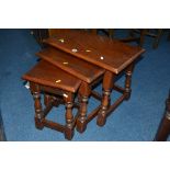 AN OLD CHARM OAK NEST OF THREE TABLES