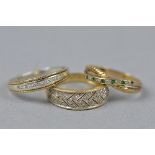 THREE RINGS, to include a modern 14ct gold diamond set band ring, ring size T, estimated total