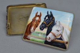 A DISTRESSED SILVER AND ENAMELLED DECORATED WITH THREE HORSES CIGARETTE CASE