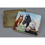 A DISTRESSED SILVER AND ENAMELLED DECORATED WITH THREE HORSES CIGARETTE CASE